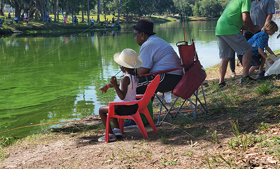 Child fishing at Tuscawilla Park